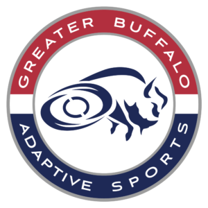 Circle logo for Greater Buffalo Adaptive Sports; red on top half of the outer circle; blue on bottom half of the circle; a artistic rendition of a buffalo outline with wheels for the back legs.