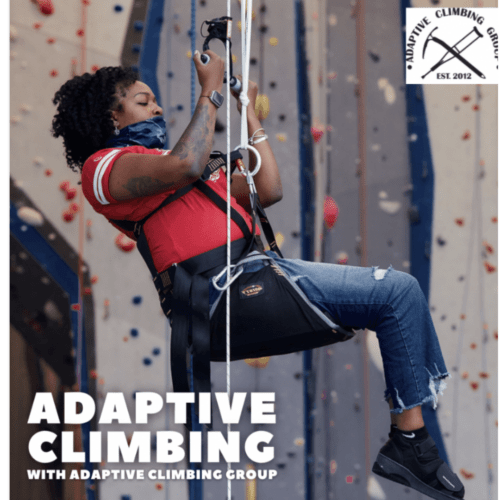 A woman is rock climbing using an adaptive harness and ratchet gear mechanism to raise herself up the face of the wall