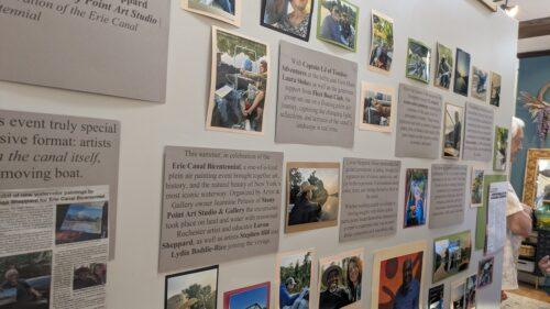 Up close of wall panels that describe paintings and photos in an art studio